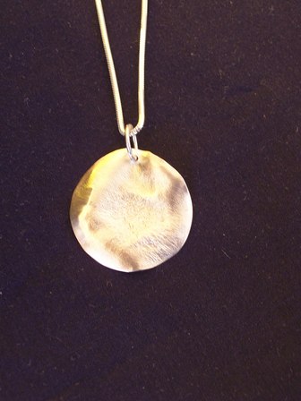 Small Moon Pendant by Carlina Goffe